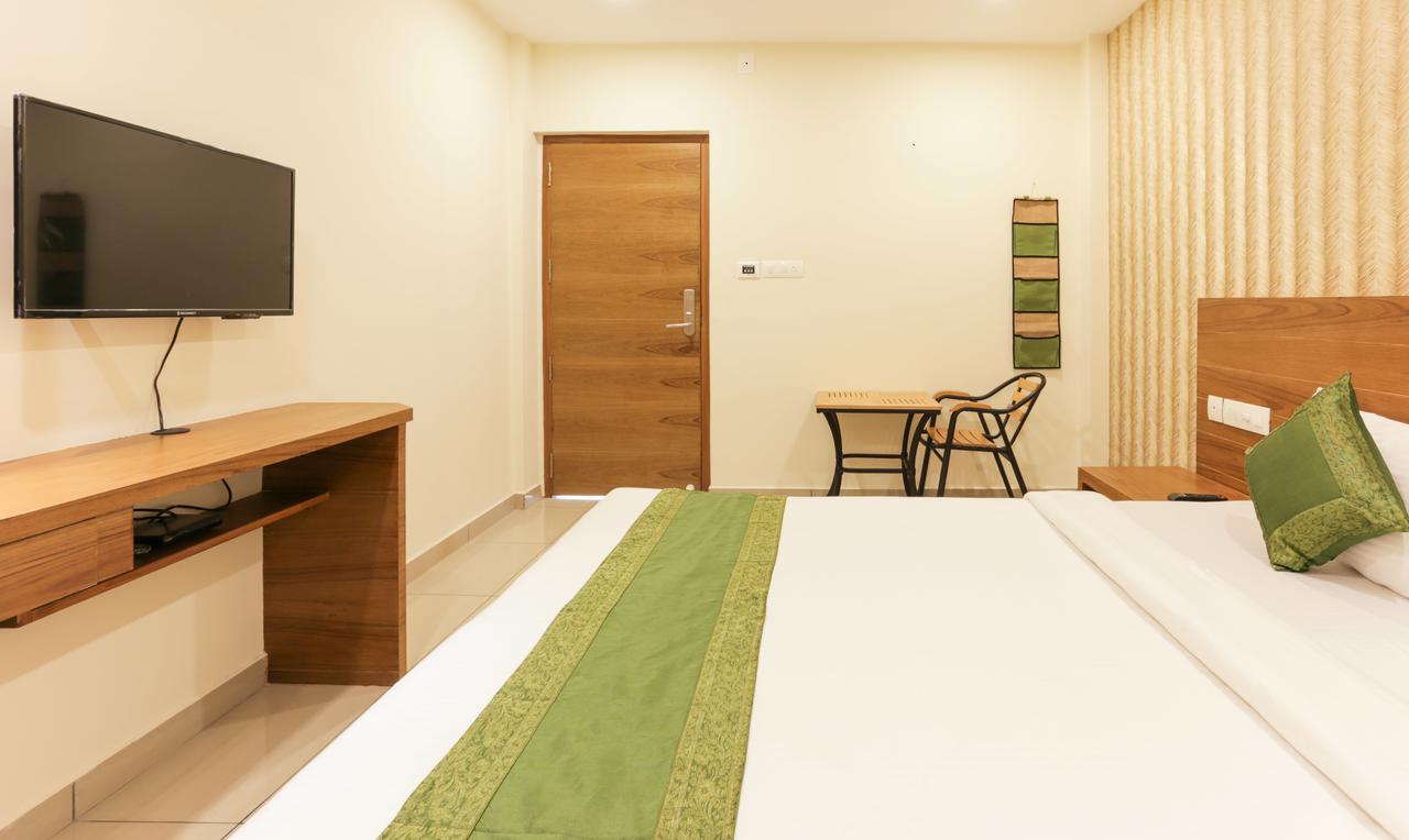 Treebo Trend Cmks Gulmohar Suites Kochi Extérieur photo