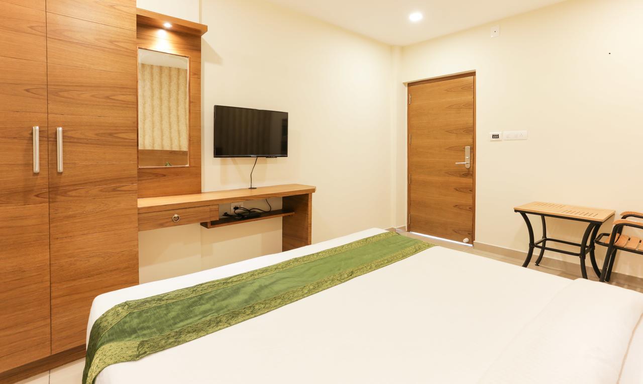 Treebo Trend Cmks Gulmohar Suites Kochi Extérieur photo